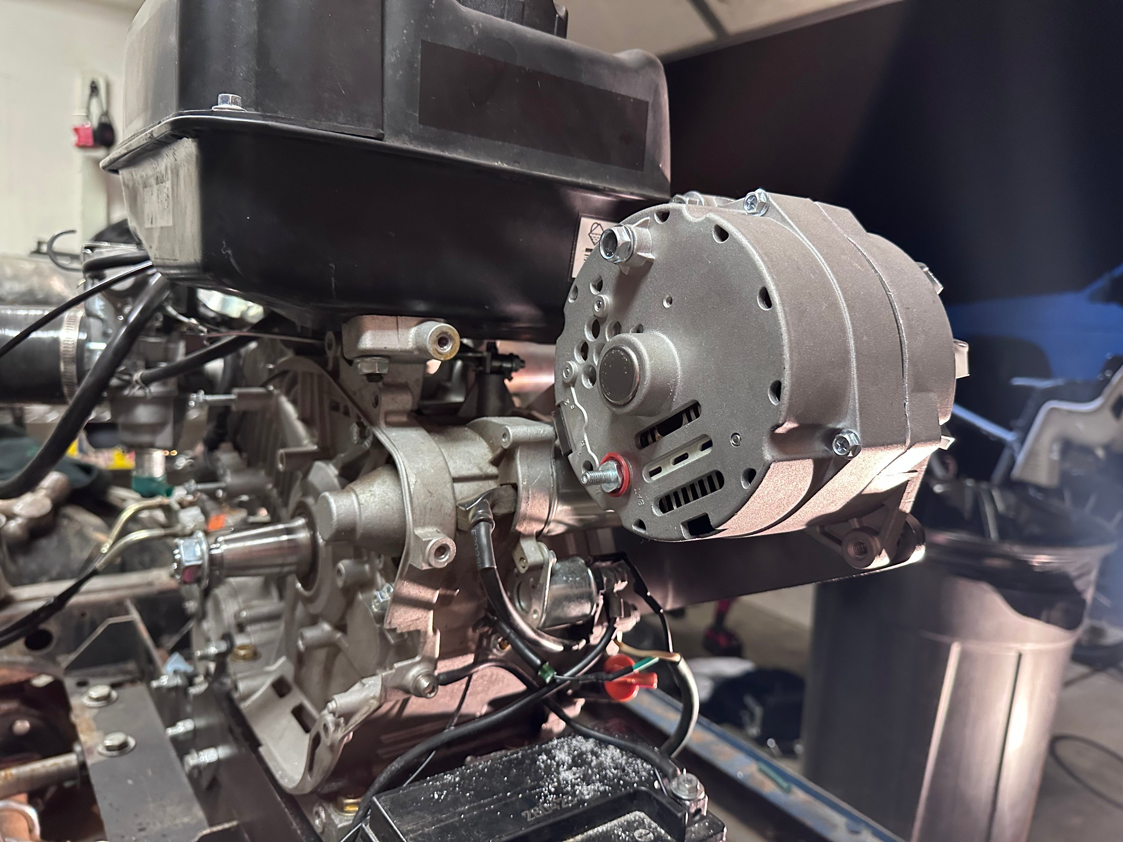 Honda GX390, Predator 420, Predator 459 alternator bracket (10:00 clock position, with fuel tank installed)