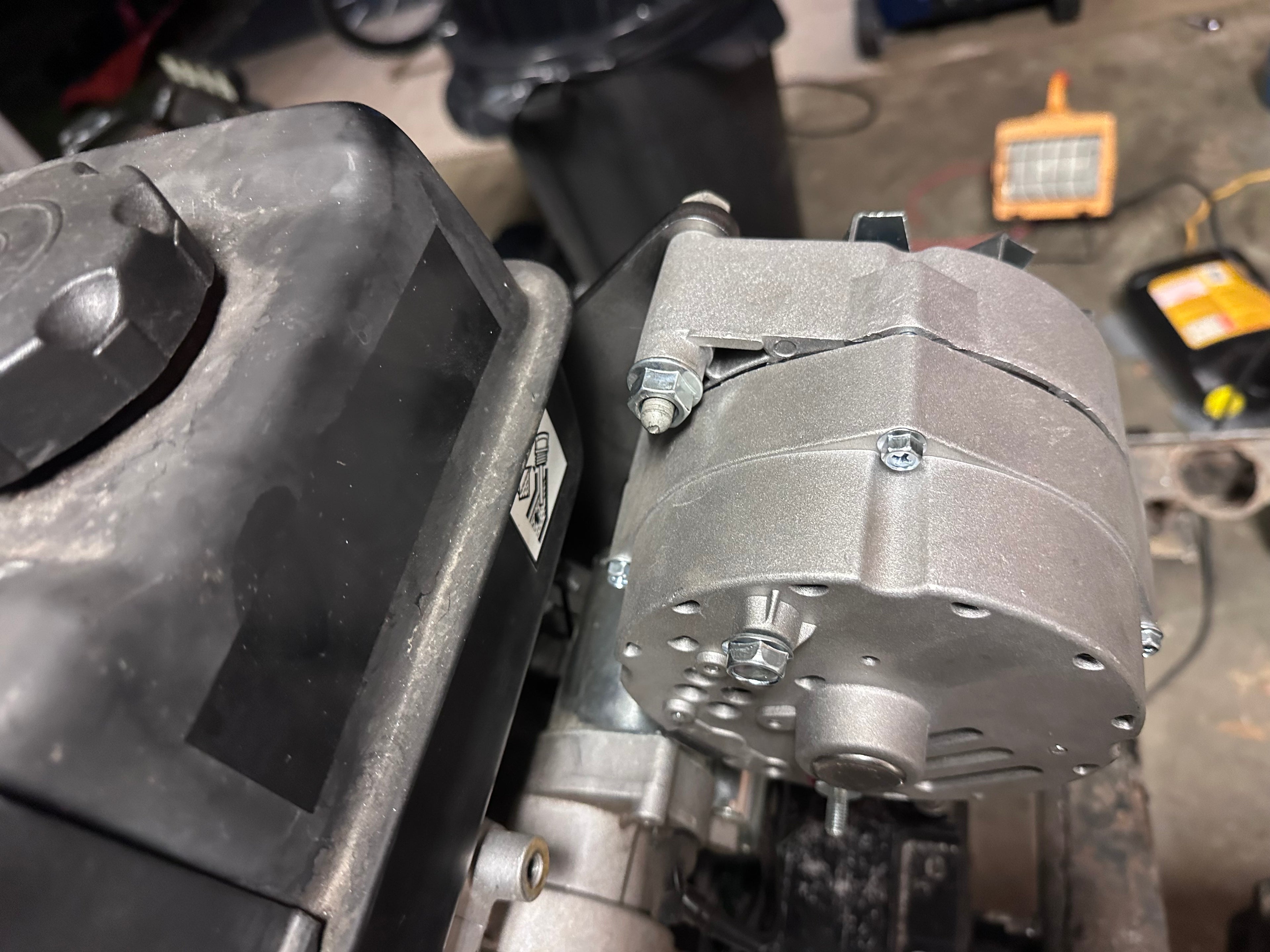 Honda GX390, Predator 420, Predator 459 alternator bracket (10:00 clock position, with fuel tank installed)