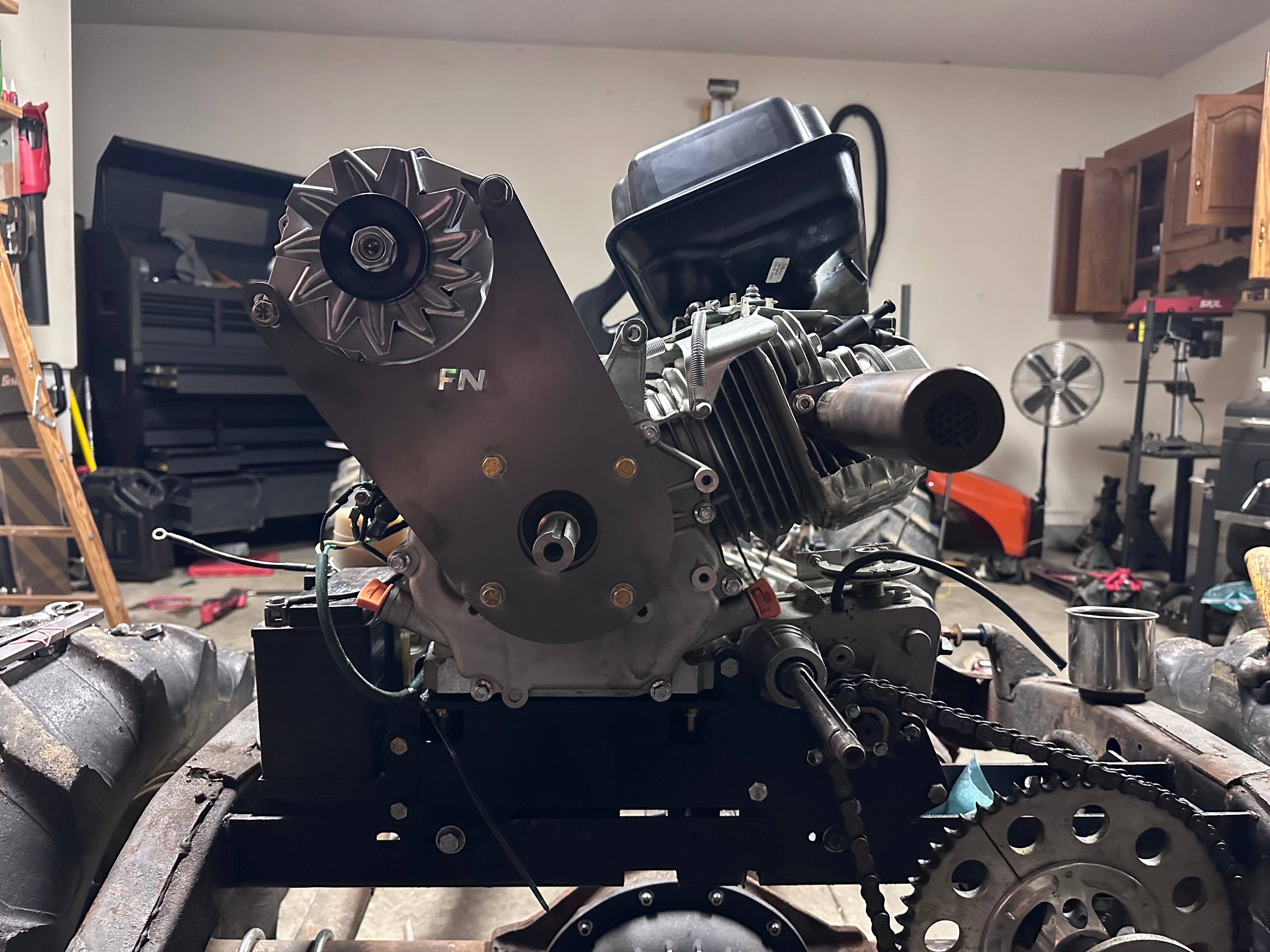 Honda GX390, Predator 420, Predator 459 alternator bracket (shorty 11:00, fuel tank must be removed permanently to fit this bracket)